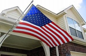 photo of a flag flying on a home